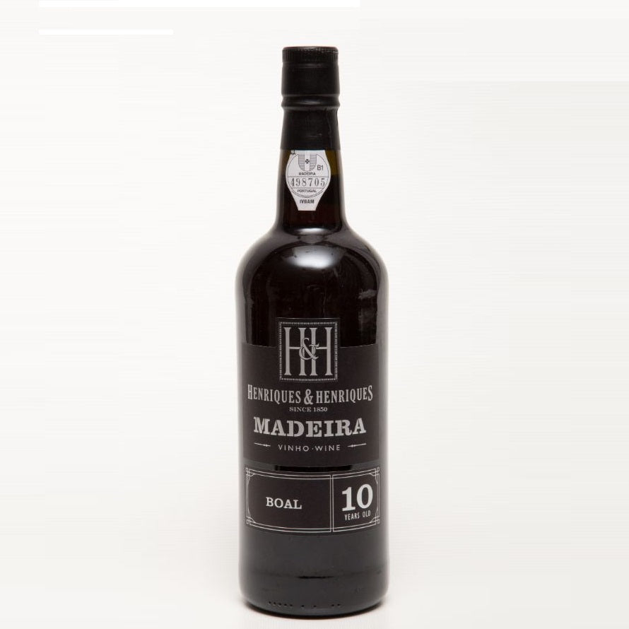 A bottle of H&H 10 Year Madeira, available at our Palm Springs wine store, Perry's.