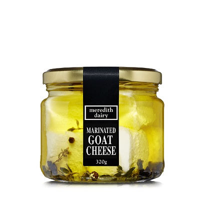 A jar of Meredith Dairy marinated goat cheese, available at our Palm Springs liquor store, Perry's.